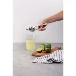 عصارة ليمون من ترامونتينا يوتيليتا مصنوعة من الفولاذ المقاوم للصدأ بمقبض من البولي بروبيلين الأبيض