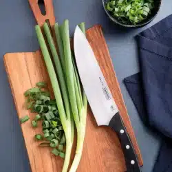 Alternative view of سكين الطاهي ترامونتينا بشفرة من الفولاذ المقاوم للصدأ ومقبض من البولي كربونات الأسود، ٨ بوصات